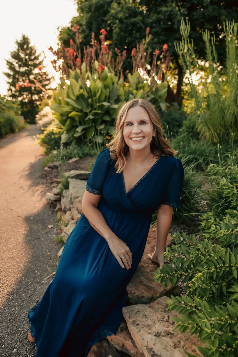 Dr. Kylie Pottenger smiling while seated in a garden