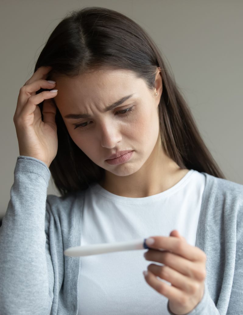 Woman facing infertility challenges and IVF treatment - finding emotional support and hope through specialized counseling